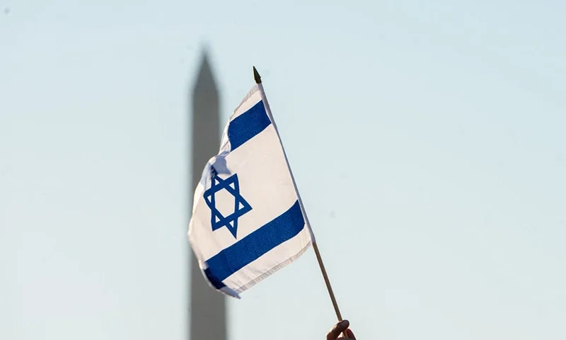 TOPSHOT - Demonstrators in support of Israel gather to denounce antisemitism and call for the release of Israeli hostages, on the National Mall in Washington, DC, on November 14, 2023. Thousands of civilians, both Palestinians and Israelis, have died since October 7, 2023, after Palestinian Hamas militants based in the Gaza Strip entered southern Israel in an unprecedented attack triggering a war declared by Israel on Hamas with retaliatory bombings on Gaza. (Photo by Stefani Reynolds / AFP) (Photo by STEFANI REYNOLDS/AFP via Getty Images)