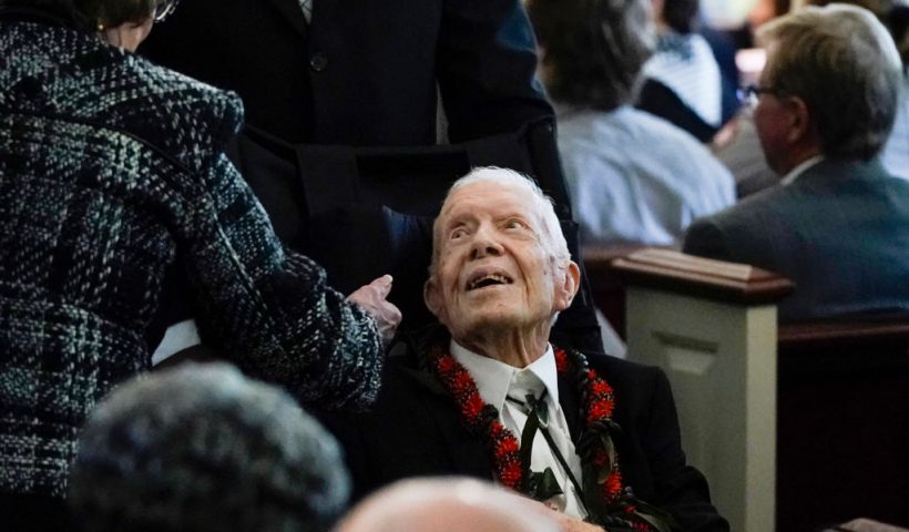 Former US President Jimmy Carter departs a funeral service for former US First Lady Rosalynn Carter, at Maranatha Baptist Church in Plains, Georgia, on November 29, 2023. Former US first lady Rosalynn Carter, who died last week at the age of 96, will be buried at her home in Georgia later on November 29, 2023, following a private funeral service attended by her ailing husband Jimmy Carter. The burial comes after a public ceremony on November 28, 2023, in Atlanta where President Joe Biden and former president Bill Clinton, as well as all five living first ladies, paid their final respects. (Photo by Alex Brandon / POOL / AFP) (Photo by ALEX BRANDON/POOL/AFP via Getty Images)