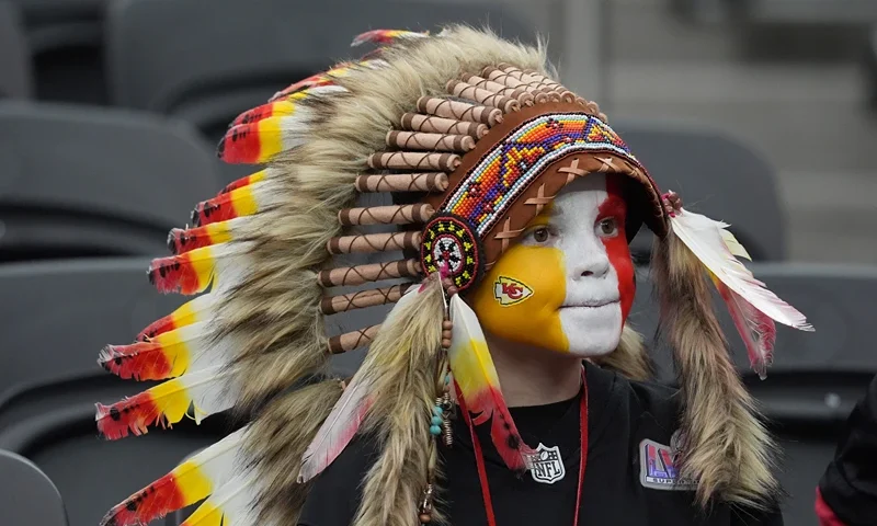 Young fan of the Kansas City Chiefs Holden Armenta waits for the start of Super Bowl LVIII between the Kansas City Chiefs and the San Francisco 49ers at Allegiant Stadium in Las Vegas, Nevada, on February 11, 2024. (Photo by TIMOTHY A. CLARY / AFP) (Photo by TIMOTHY A. CLARY/AFP via Getty Images)