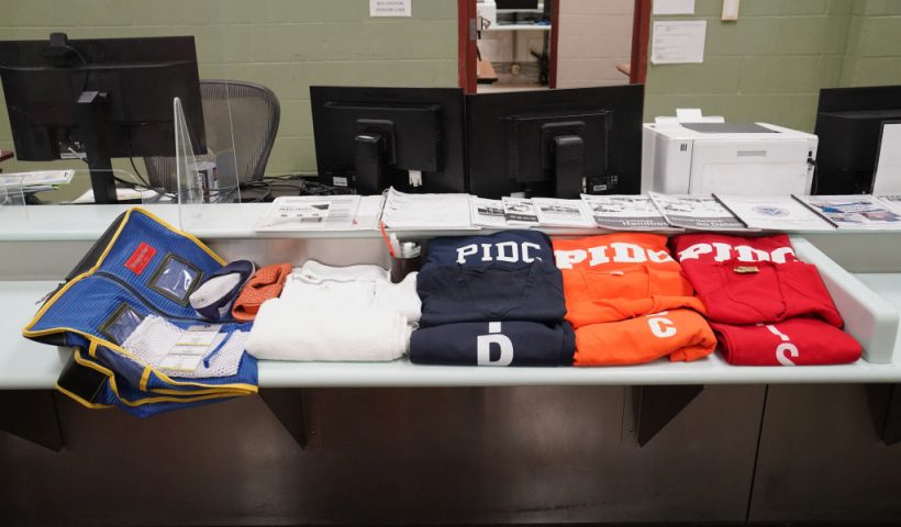 Clothes and personal hygiene items provided to detainees are displayed during a media tour of the Port Isabel Detention Center (PIDC), hosted by U.S. Immigration and Customs Enforcement (ICE) Harlingen Enforcement and Removal Operations (ERO), in Los Fresnos, Texas, June 10, 2024. Behind barbed metal fences topped with barbed wire, men play volleyball and basketball at a detention center in Texas, passing time as they wait to hear if they will be allowed to stay in the United States. They are among more than 1,000 housed at this former naval base in the US city of Los Fresnos, just a few miles from the Mexican border, which they all crossed illegally. (Photo by Veronica G. Cardenas / POOL / AFP) (Photo by VERONICA G. CARDENAS/POOL/AFP via Getty Images)