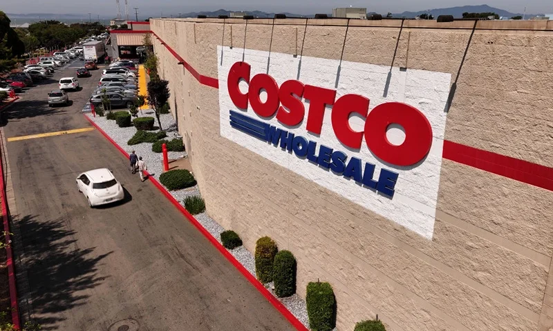 RICHMOND, CALIFORNIA - JULY 11: In an aerial view, the Costco logo is displayed on the exterior of a Costco store on July 11, 2024 in Richmond, California. Costco announced plans to raise membership fees for the first time since 2017 with a $5 jump to $65 a year from $60. (Photo by Justin Sullivan/Getty Images)