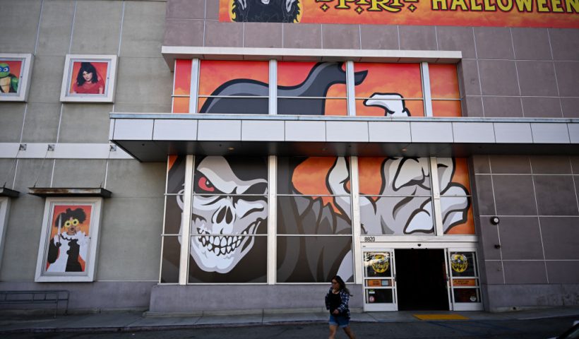 The "Jack The Reaper" logo displayed in the windows of a Spirit Halloween seasonal holiday store in the location of a closed former Bed Bath and Beyond retail store on August 26, 2024 in Los Angeles, California. The Spirit banner logo has spread as an internet meme of the retail apocalypse at shopping centers and strip malls across the United States. (Photo by Patrick T. Fallon / AFP) (Photo by PATRICK T. FALLON/AFP via Getty Images)