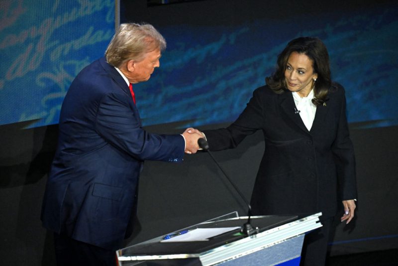 US Vice President and Democratic presidential candidate Kamala Harris (R) shakes hands with former US President and Republican presidential candidate Donald Trump during a presidential debate at the National Constitution Center in Philadelphia, Pennsylvania, on September 10, 2024. (Photo by SAUL LOEB / AFP) (Photo by SAUL LOEB/AFP via Getty Images)