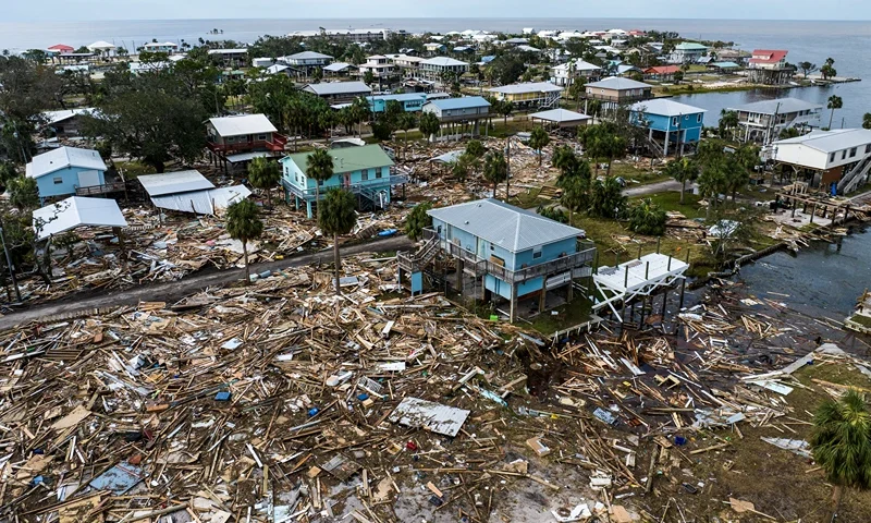 An aerial view of damaged houses are seen after Hurricane Helene made landfall in Horseshoe Beach, Florida, on September 28, 2024. At least 44 people died across five US states battered by powerful storm Helene, authorities said on September 27, after torrential flooding prompted emergency responders to launch massive rescue operations. (Photo by CHANDAN KHANNA / AFP) (Photo by CHANDAN KHANNA/AFP via Getty Images)