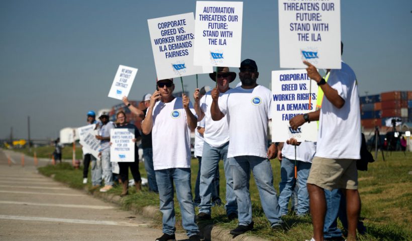Dockworkers strike at the Bayport Container Terminal in Seabrook, Texas, on October 1, 2024. Officials at 14 ports along the US East and Gulf Coasts were making last-minute preparations on September 30 for a likely labor strike that could drag on the US economy just ahead of a presidential election -- despite last-minute talks. (Photo by Mark Felix / AFP) (Photo by MARK FELIX/AFP via Getty Images)