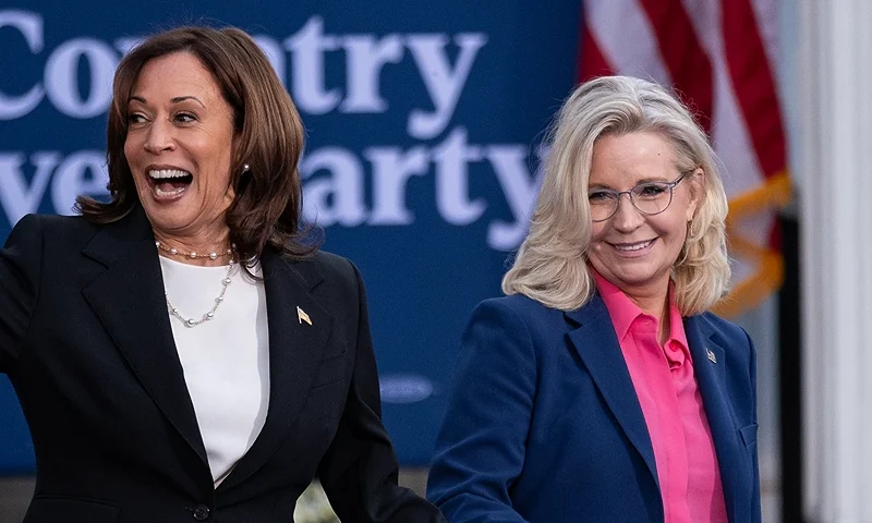 RIPON, WISCONSIN - OCTOBER 3: Vice President and Democratic Presidential nominee Kamala Harris walks out with former US representative Liz Cheney during a rally at Ripon College on October 3, 2024 in Ripon, Wisconsin. The rally comes a day after Harris visited Georgia to assess the aftermath of Hurricane Helene. (Photo by Jim Vondruska/Getty Images)