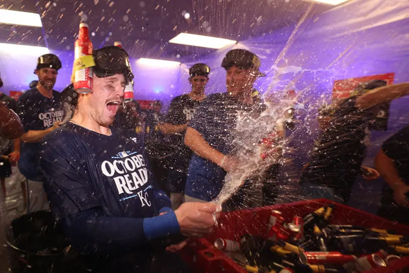 Bobby Witt Jr. #7 of the Kansas City Royals celebrates in the locker room after defeating the Baltimore Orioles in the Wild Card Series at Oriole Park at Camden Yards on October 02, 2024 in Baltimore, Maryland. (Photo by Patrick Smith/Getty Images)