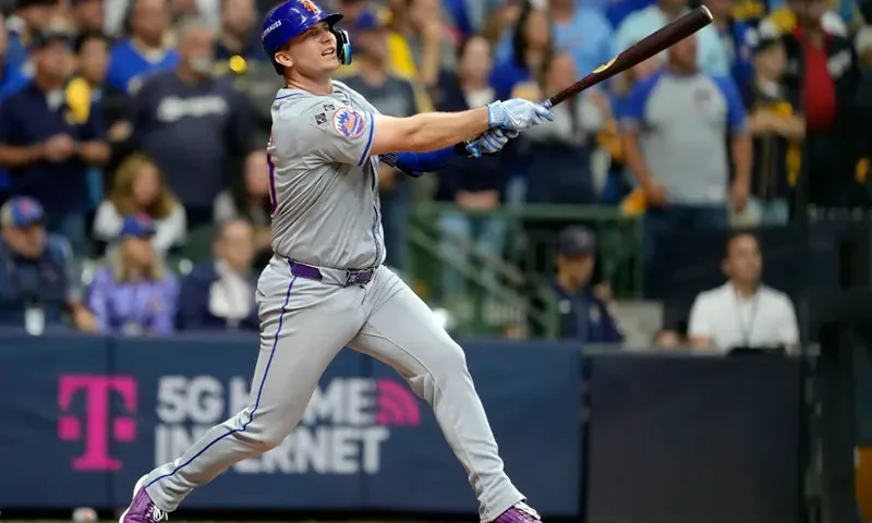 Pete Alonso #20 of the New York Mets hits a home run in the ninth inning against the Milwaukee Brewers during Game Three of the Wild Card Series at American Family Field on October 03, 2024 in Milwaukee, Wisconsin. (Photo by Patrick McDermott/Getty Images)