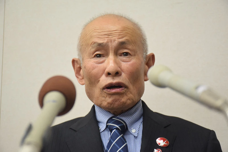 TOPSHOT - CORRECTION / Tomoyuki Mimaki, representative director of the Nihon Hidankyo, attends a press conference after the group was awarded the 2024 Nobel Peace Prize, in Hiroshima on October 11, 2024. The Nobel Peace Prize was on October 11 awarded to the Japanese anti-nuclear group Nihon Hidankyo, a grassroots movement of atomic bomb survivors from Hiroshima and Nagasaki, also known as Hibakusha. (Photo by JIJI PRESS / AFP) / Japan OUT / "The erroneous mention[s] appearing in the metadata of this photo by STR has been modified in AFP systems in the following manner: [Toshiyuki Mimaki ] instead of [Tomoyuki Mimaki ]. Please immediately remove the erroneous mention[s] from all your online services and delete it (them) from your servers. If you have been authorized by AFP to distribute it (them) to third parties, please ensure that the same actions are carried out by them. Failure to promptly comply with these instructions will entail liability on your part for any continued or post notification usage. Therefore we thank you very much for all your attention and prompt action. We are sorry for the inconvenience this notification may cause and remain at your disposal for any further information you may require." (Photo by STR/JIJI PRESS/AFP via Getty Images)