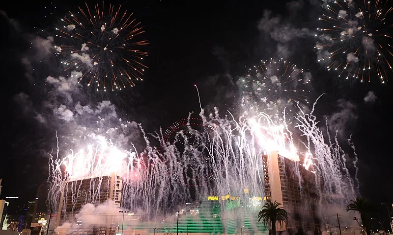 LAS VEGAS, NEVADA - OCTOBER 09: A 555-drone and fireworks display by Fireworks by Grucci precedes the implosion of the 23-story Paradise (L) and Club hotel towers of the Tropicana Las Vegas on October 09, 2024 in Las Vegas, Nevada. The hotel-casino opened in 1957 and closed permanently in April 2024 to make way for a planned USD 1.5 billion, 33,000-seat domed stadium for Major League Baseball's Oakland Athletics and a related resort development by Bally's Corp. and Gaming and Leisure Properties Inc. MLB owners approved the team's relocation to Nevada in November 2023, and the A's hope to move into the ballpark, which will occupy nine acres of the 35-acre site, in 2028. (Photo by Ethan Miller/Getty Images)