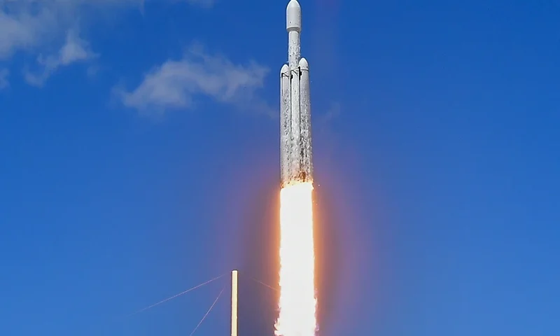 A SpaceX Falcon Heavy rocket with the Europa Clipper spacecraft aboard launches from Launch Complex 39A at NASA's Kennedy Space Center in Cape Canaveral on October 14, 2024. The spacecraft Clipper will soon launch for Jupiter's moon Europa, one of dozens of moons orbiting the Solar System's biggest planet and the nearest spot in our celestial neighborhood that could offer a perch for life. It should reach orbit around Jupiter and Europa in 2031, where it will begin a detailed study of the moon scientists believe is covered in frozen water, which could provide a similar habitat to Earth. (Photo by CHANDAN KHANNA / AFP) (Photo by CHANDAN KHANNA/AFP via Getty Images)