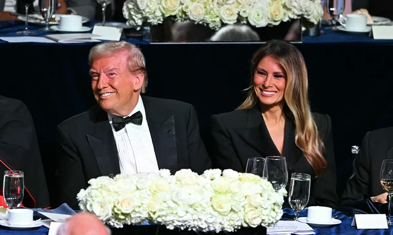 Former US President and Republican presidential candidate Donald Trump (L) and former US First Lady Melania Trump attend the 79th Annual Alfred E. Smith Memorial Foundation Dinner at the Hilton Midtown in New York, October 17, 2024. (Photo by Timothy A. CLARY / AFP) (Photo by TIMOTHY A. CLARY/AFP via Getty Images)