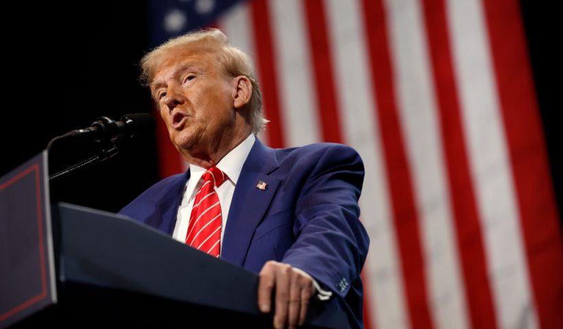 ATLANTA, GEORGIA - OCTOBER 15: Republican presidential nominee, former U.S. President Donald Trump delivers remarks during a campaign rally at the Cobb Energy Performing Arts Centre on October 15, 2024 in Atlanta, Georgia. With early voting starting today in Georgia both Trump and Democratic presidential nominee, Vice President Kamala Harris are campaigning in the Atlanta region this week as polls show a tight race. (Photo by Kevin Dietsch/Getty Images)