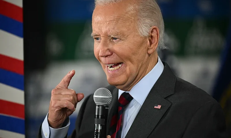 US President Joe Biden speaks to staff as he visits a New Hampshire Democratic coordinated campaign office in Concord, New Hampshire, on October 22, 2024. (Photo by Mandel NGAN / AFP) (Photo by MANDEL NGAN/AFP via Getty Images)