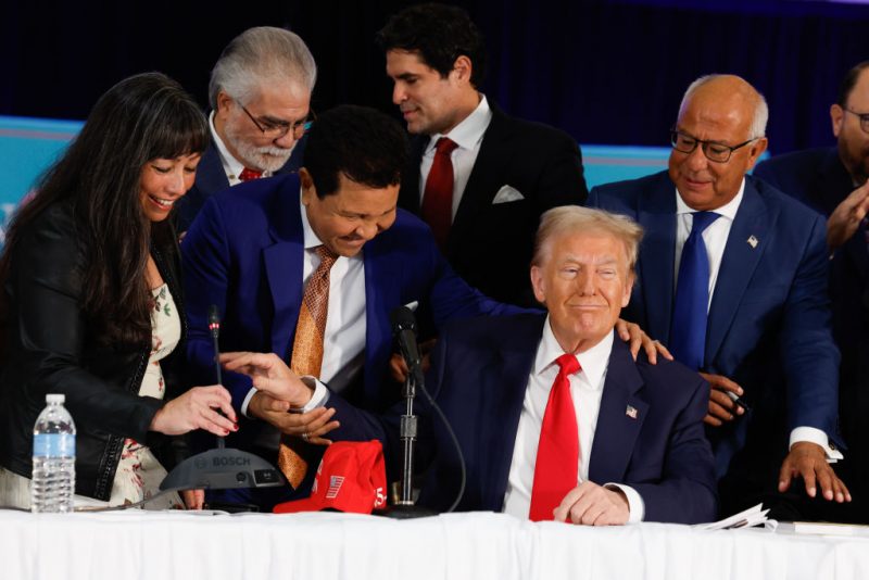 DORAL, FLORIDA - OCTOBER 22: Republican presidential nominee, former U.S. President Donald Trump participates in a roundtable discussion at the Latino Summit held at Trump National Doral Golf Club on October 22, 2024 in Doral, Florida. With 14 days to go until Election Day, Trump and Democratic presidential nominee, U.S. Vice President Kamala Harris continue to crisscross the country asking for votes. (Photo by Anna Moneymaker/Getty Images)