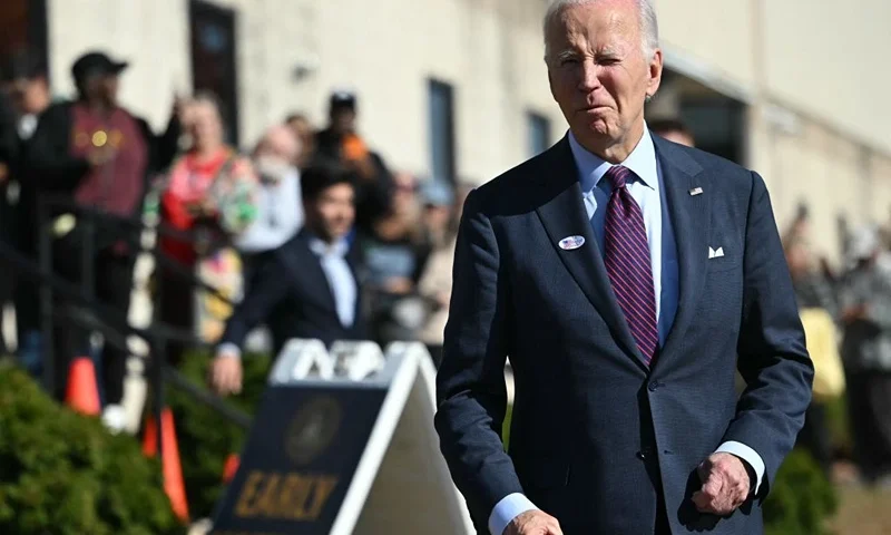 US President Joe Biden arrive to speak to reporters after casting his early-voting ballot in the 2024 general election in New Castle, Delaware, October 28, 2024. (Photo by ANDREW CABALLERO-REYNOLDS / AFP) (Photo by ANDREW CABALLERO-REYNOLDS/AFP via Getty Images)