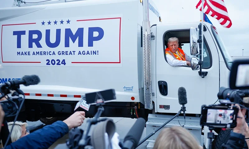 GREEN BAY, WISCONSIN - OCTOBER 30: (EDITOR'S NOTE: Alternate crop) Republican presidential nominee, former President Donald Trump holds a press conference from inside trash hauler at Green Bay Austin Straubel International Airport on October 30, 2024 in Green Bay, Wisconsin. With less than a week until Election Day, Trump is campaigning for re-election in the battleground states of North Carolina and Wisconsin. (Photo by Chip Somodevilla/Getty Images)