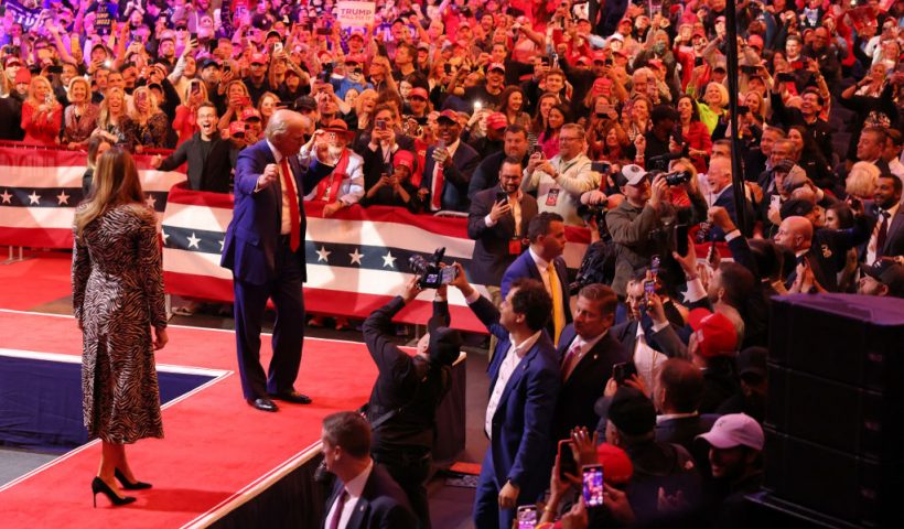 NEW YORK, NEW YORK - OCTOBER 27: Former first lady Melania Trump and Republican presidential nominee, former U.S. President Donald Trump walk off the stage after a campaign rally at Madison Square Garden on October 27, 2024 in New York City. Trump closed out his weekend of campaigning in New York City with a guest list of speakers that includes his running mate Republican Vice Presidential nominee, U.S. Sen. J.D. Vance (R-OH), Tesla CEO Elon Musk, UFC CEO Dana White, and House Speaker Mike Johnson, among others, nine days before Election Day. (Photo by Michael M. Santiago/Getty Images)