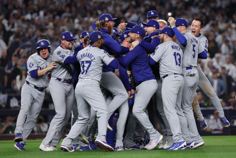 NEW YORK, NEW YORK - OCTOBER 30: The Los Angeles Dodgers celebrate as the they defeat the New York Yankees 7-6 in game 5 to win the 2024 World Series at Yankee Stadium on October 30, 2024 in the Bronx borough of New York City. (Photo by Elsa/Getty Images)