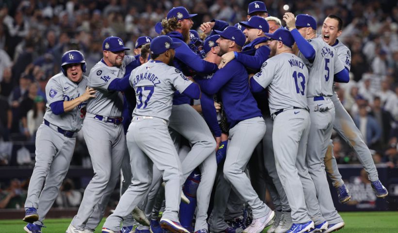 NEW YORK, NEW YORK - OCTOBER 30: The Los Angeles Dodgers celebrate as the they defeat the New York Yankees 7-6 in game 5 to win the 2024 World Series at Yankee Stadium on October 30, 2024 in the Bronx borough of New York City. (Photo by Elsa/Getty Images)