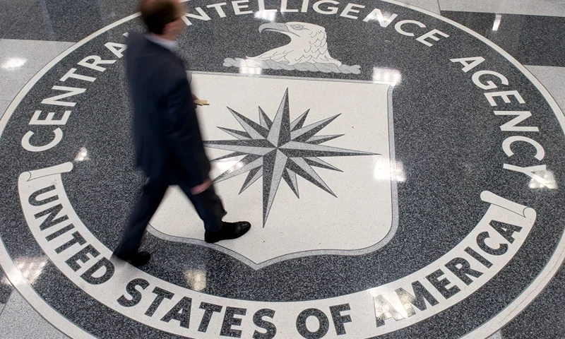 A man crosses the Central Intelligence Agency (CIA) seal in the lobby of CIA Headquarters in Langley, Virginia, on August 14, 2008. AFP PHOTO/SAUL LOEB (Photo by SAUL LOEB / AFP) (Photo by SAUL LOEB/AFP via Getty Images)