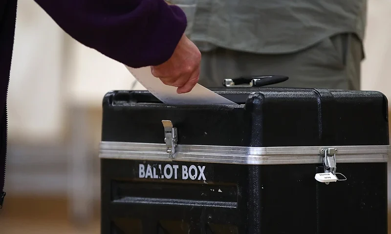 A voter casts his ballot in a polling station at Hellgate Elementary School on May 25, 2017 in Missoula, Montana. Montanans are heading to the polls to vote in a special election to fill the state's sole U.S. Congressional seat that was vacated by fomer U.S. Rep. Ryan Zinke (R-MT) who became the Secretary of the Interior. GOP candidate Greg Gianforte is in a tight race with democrat Rob Quist. Gianforte is in the news after allegedly assaulting a reporter at a campaign event on May 24. (Photo by Justin Sullivan/Getty Images)