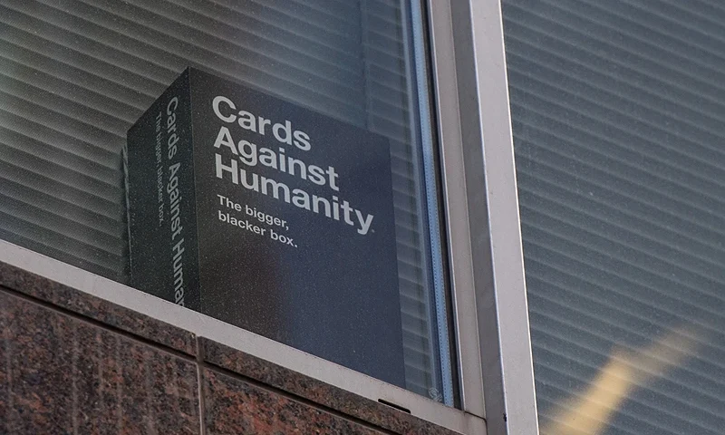 LONDON, ENGLAND - MARCH 21: A copy of the game 'Cards Against Humanity' is seen in a the window of the floor occupied by company Cambridge Analytica on March 21, 2018 in London, England. UK authorities are currently seeking a warrant to search the premises of Cambridge Analytica after the company has been involved in a row over its use of Facebook data. Their CEO Alexander Nix has since been suspended. (Photo by Chris J Ratcliffe/Getty Images)
