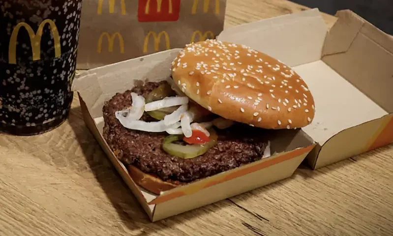 A McDonald's Quarter Pounder hamburger and coke, are seen in an illustration picture taken in New York City, U.S., October 24, 2024. REUTERS/Brendan McDermid/File Photo