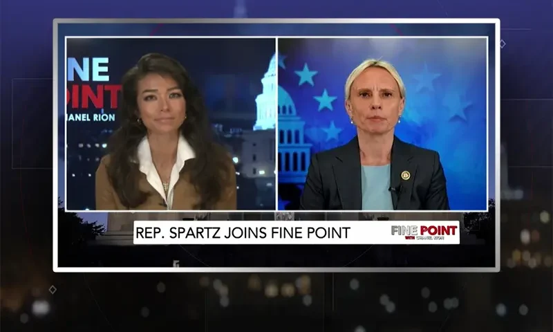 Video still from Fine Point on One America News Network showing a split screen of the host on the left side, and on the right side is the guest, Victoria Spartz.