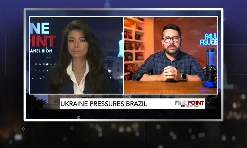 Video still from Fine Point on One America News Network showing a split screen of the host on the left side, and on the right side is the guest, Paulo Figueiredo.