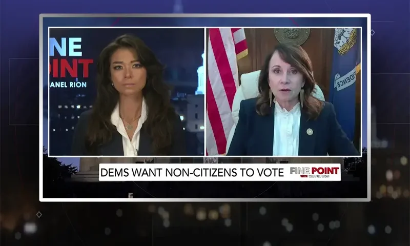 Video still from Fine Point on One America News Network showing a split screen of the host on the left side, and on the right side is the guest, Liz Murrill.