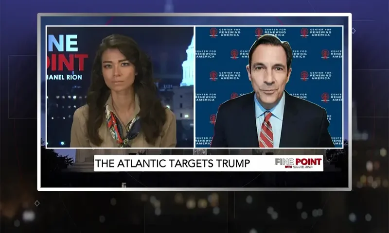 Video still from Fine Point on One America News Network showing a split screen of the host on the left side, and on the right side is the guest, Mark Paoletta.