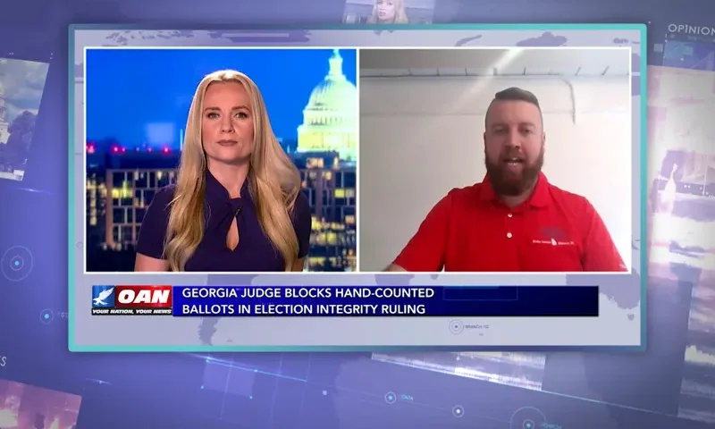 Video still from Ivory Hecker Tonight on One America News Network showing a split screen of the host on the left side, and on the right side is the guest, Jordan Ridley.