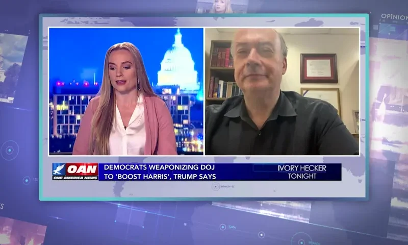 Video still from Ivory Hecker Tonight on One America News Network showing a split screen of the host on the left side, and on the right side is the guest, Jeff Clark.