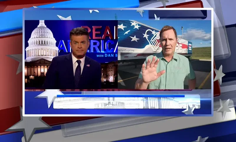 Video still from Real America on One America News Network showing a split screen of the host on the left side, and on the right side is the guest, Ethan Forhetz.