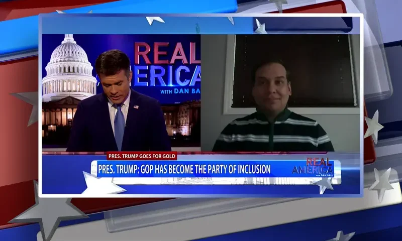 Video still from Real America on One America News Network showing a split screen of the host on the left side, and on the right side is the guest, George Santos.