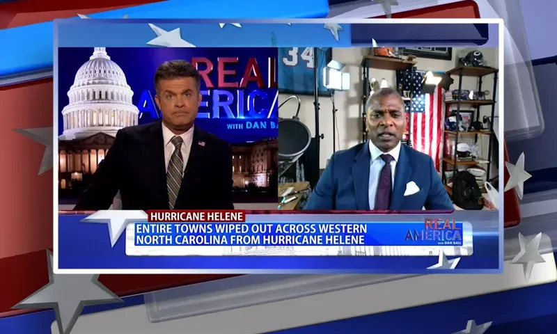 Video still from Real America on One America News Network showing a split screen of the host on the left side, and on the right side is the guest, Jack Brewer.