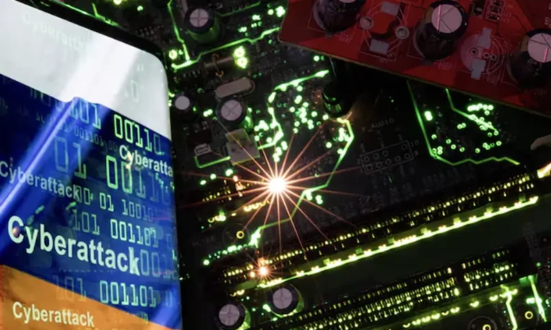 A smartphone with a displayed Russian flag with the word "Cyberattack" and binary codes over it is placed on a computer motherboard in this illustration taken February 23, 2023. REUTERS/Dado Ruvic/Illustration/File Photo