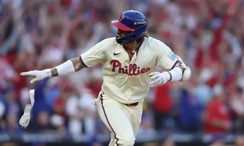 Philadelphia Phillies outfielder Nick Castellanos (8) runs the bases after hitting a home run in the sixth inning against the New York Mets during game two of the NLDS for the 2024 MLB Playoffs at Citizens Bank Park. Mandatory Credit: Bill Streicher-Imagn Images