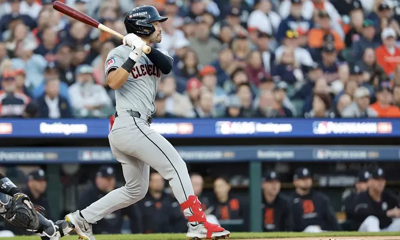 Cleveland Guardians outfielder Steven Kwan (38) hits a single hits a single in the first inning against the Detroit Tigers during game four of the ALDS for the 2024 MLB Playoffs at Comerica Park. Mandatory Credit: Rick Osentoski-Imagn Images