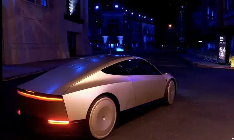 Tesla CEO and X owner Elon Musk rides in Tesla's robotaxi at an unveilling event in Los Angeles, California, U.S. October 10, 2024 in this still image taken from video. Tesla/Handout via REUTERS