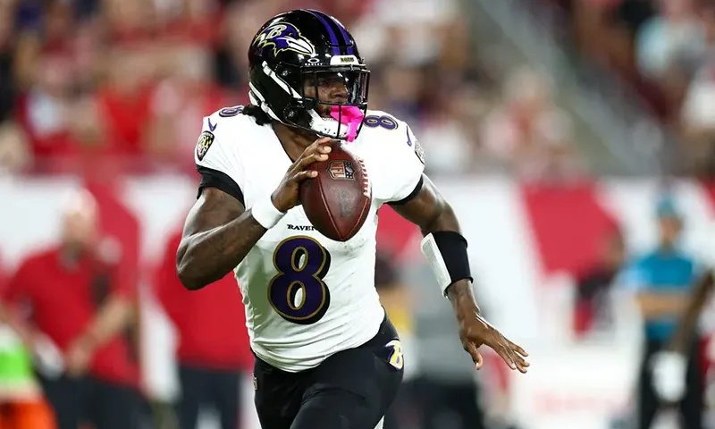 Baltimore Ravens quarterback Lamar Jackson (8) drops back to pass against the Tampa Bay Buccaneers in the second quarter at Raymond James Stadium. Mandatory Credit: Nathan Ray Seebeck-Imagn Images