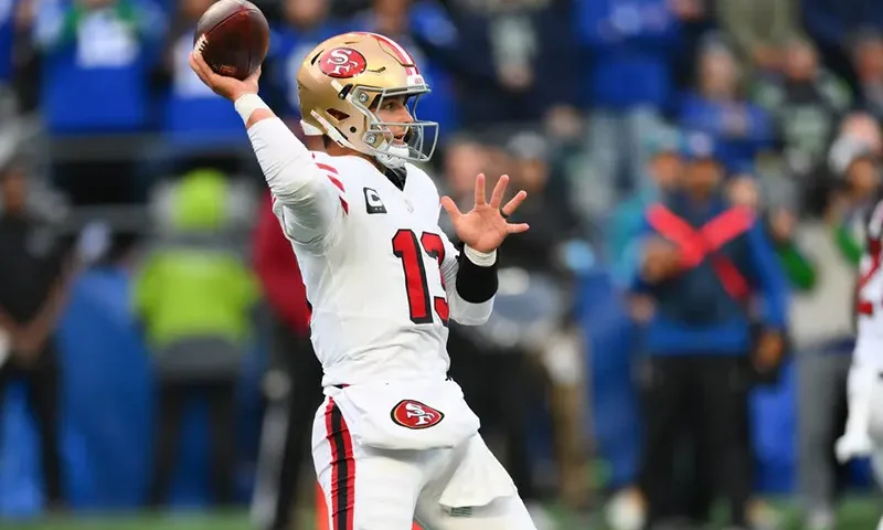 San Francisco 49ers quarterback Brock Purdy (13) passes the ball against the Seattle Seahawks during the first half at Lumen Field. Mandatory Credit: Steven Bisig-Imagn Images