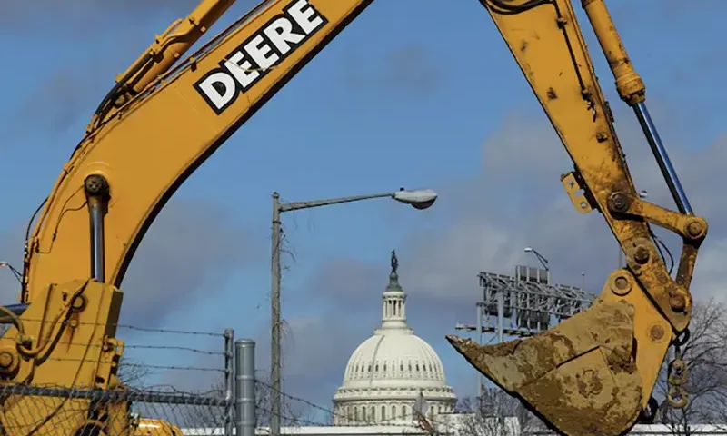 A back loader bucket is seen near the U.S. Capitol in Washington February 27, 2013. REUTERS/Gary Cameron/File Photo