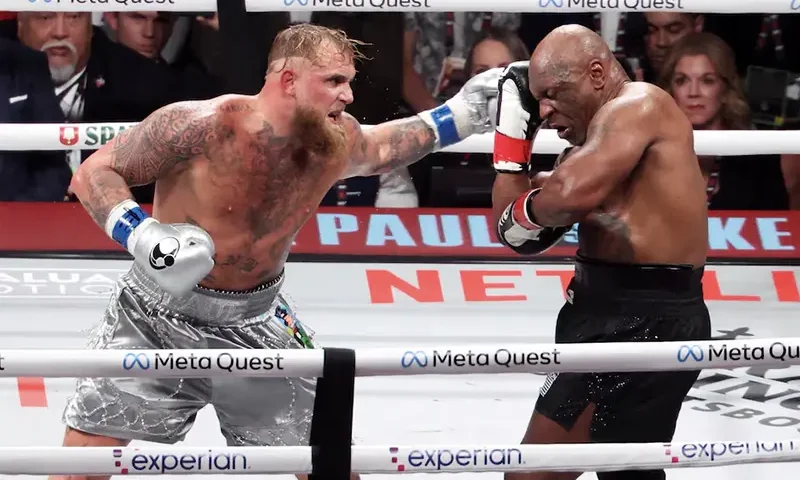 Mike Tyson (black gloves) fights Jake Paul (silver gloves) at AT&T Stadium. Kevin Jairaj-Imagn Images/File Photo