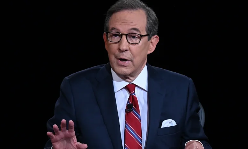 Debate moderator and Fox News anchor Chris Wallace directs the first presidential debate between U.S. President Donald Trump and Democratic presidential nominee Joe Biden at the Health Education Campus of Case Western Reserve University on September 29, 2020 in Cleveland, Ohio. This is the first of three planned debates between the two candidates in the lead up to the election on November 3. (Photo by Olivier Douliery-Pool/Getty Images)