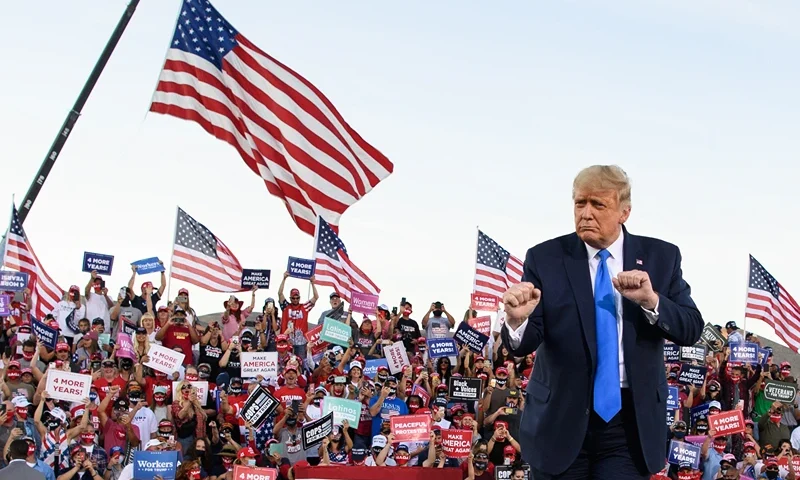 US President Donald Trump dances at the end of a rally at Carson City Airport in Carson City, Nevada on October 18, 2020. (Photo by MANDEL NGAN / AFP) (Photo by MANDEL NGAN/AFP via Getty Images)