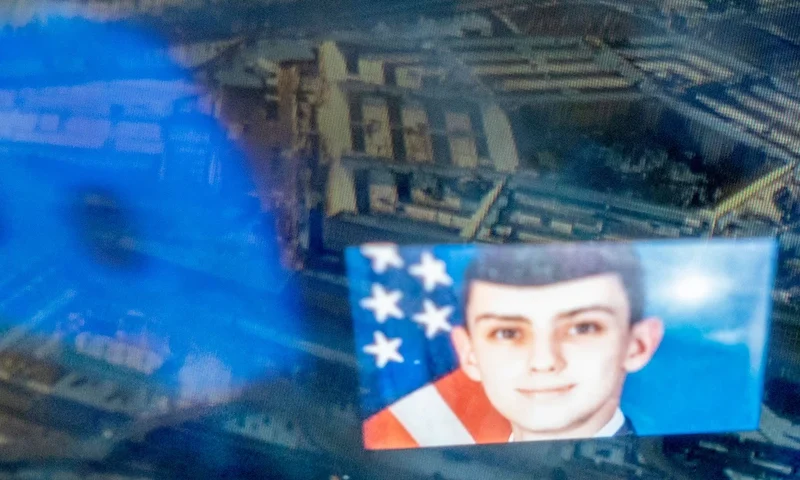 TOPSHOT - This photo illustration created on April 13, 2023, shows the Discord logo and the suspect, national guardsman Jack Teixeira, reflected in an image of the Pentagon in Washington, DC. - FBI agents on Thursday arrested a young national guardsman suspected of being behind a major leak of sensitive US government secrets -- including about the Ukraine war. US Attorney General Merrick Garland announced the arrest made "in connection with an investigation into alleged unauthorized removal, retention and transmission of classified national defense information." (Photo by Stefani REYNOLDS / AFP) (Photo by STEFANI REYNOLDS/AFP via Getty Images)