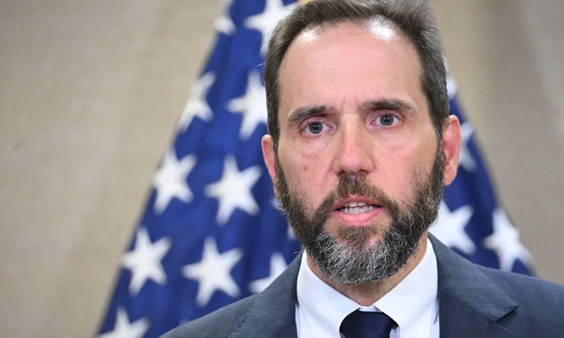 Special Counsel Jack Smith speaks to the press at the US Department of Justice in Washington, DC, on June 9, 2023, announcing the unsealing of the indictment against former US President Donald Trump. Smith, the prosecutor in the unprecedented criminal case against Trump said Friday that US law applies to everyone no matter their status, and pledged to pursue a speedy trial. "We have one set of laws in this country, and they apply to everyone," said Smith, shortly after a 37-count indictment accusing Trump of illegally taking highly classified documents was unsealed. (Photo by Mandel NGAN / AFP) (Photo by MANDEL NGAN/AFP via Getty Images)
