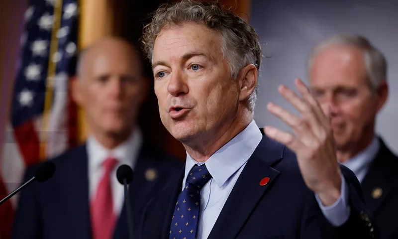 WASHINGTON, DC - DECEMBER 20: Sen. Rand Paul (R-KY) speaks against the federal omnibus spending legislation for FY 2023 that at a news conference with Sen. Rick Scott (R-FL) (L) and Sen. Ron Johnson (R-WI) at the U.S. Capitol on December 20, 2022 in Washington, DC. The Republican Senators oppose the bipartisan spending bill that was announced early that morning and have promised to introduce amendments, including stripping out earmarks. (Photo by Chip Somodevilla/Getty Images)